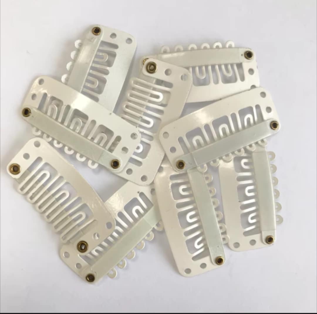 Clips pour extensions à clips