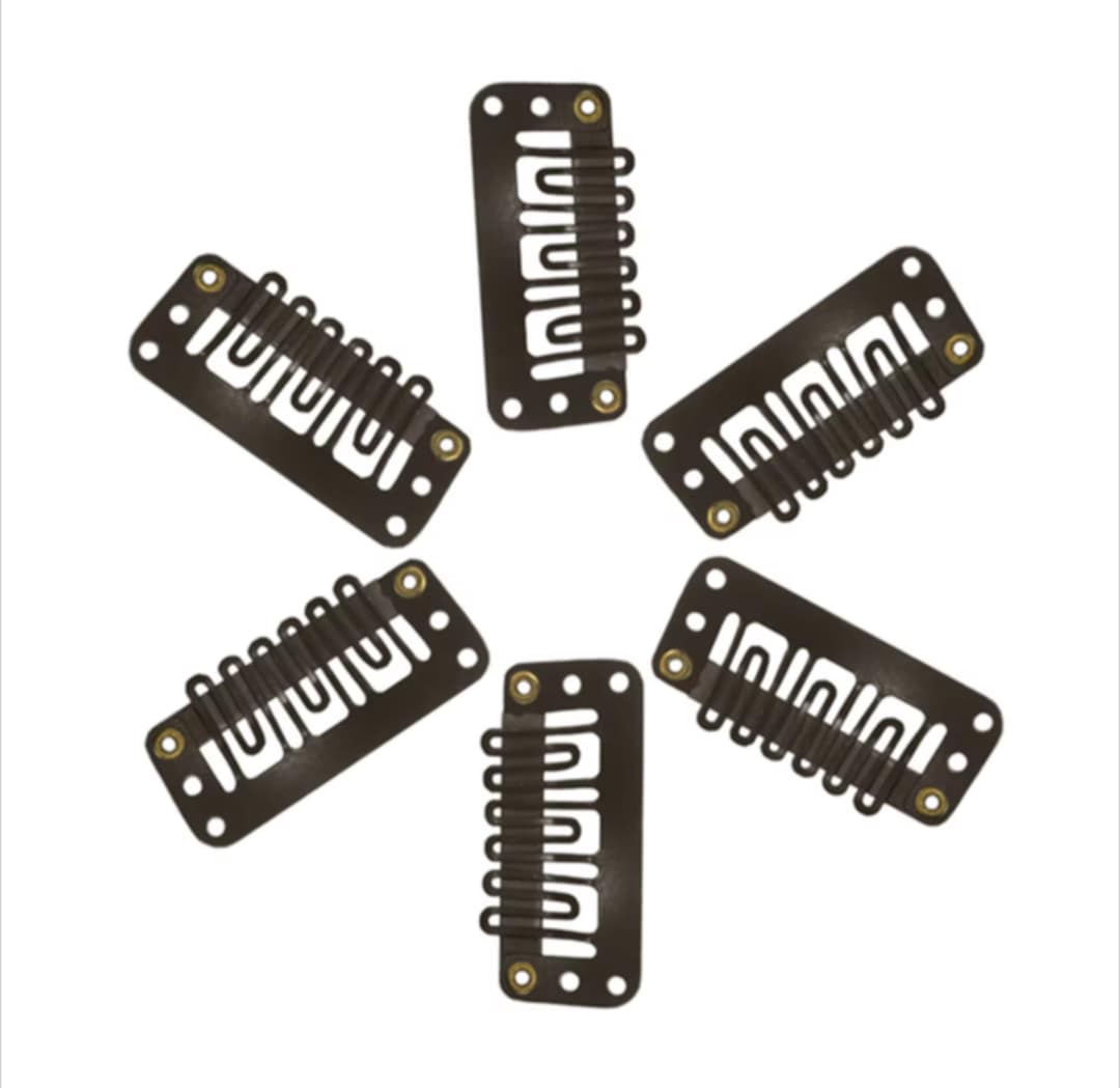 Clips pour extensions à clips