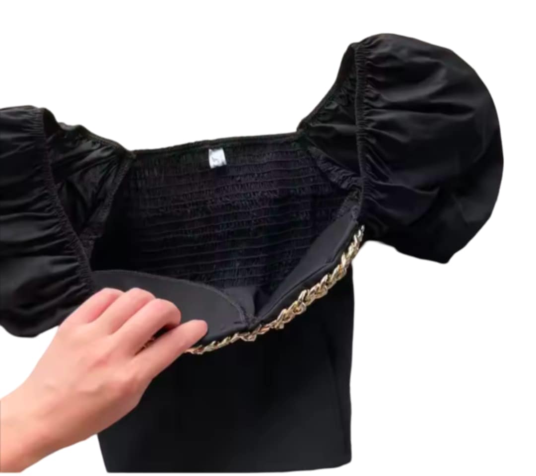 Haut à la mode avec manches bouffantes